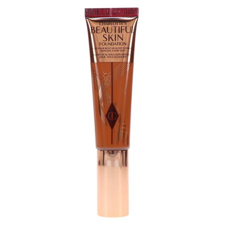 Charlotte Tilbury Beautiful Skin Foundation 14 Neutral 1 oz bottle displayed on white background