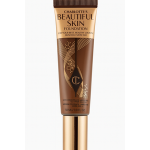 Charlotte Tilbury Beautiful Skin Foundation 30ml compact bottle with golden label on white background