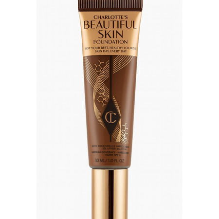 Charlotte Tilbury Beautiful Skin Foundation 30ml compact bottle with golden label on white background